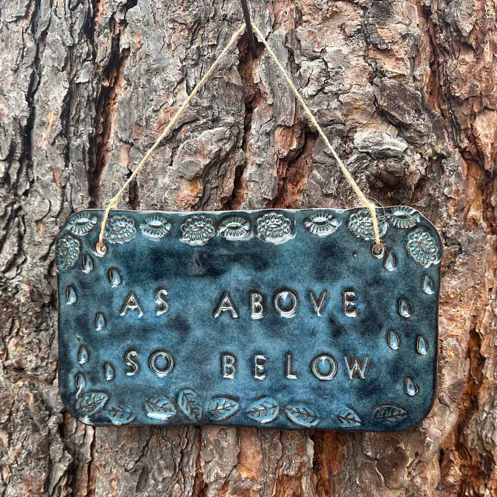 "as above so below" ceramic hanging sign in blue sapphire with stamped border