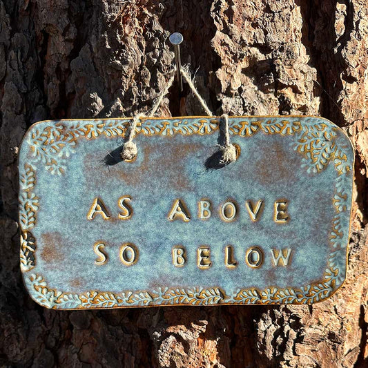 "as above so below" ceramic hanging sign in blue rutile with leaf border